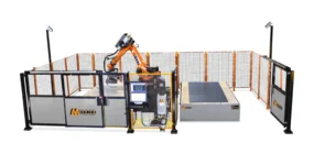 Enclosed guarding system around BACA Systems’ M Series Robo SawJet, which minimizes silica exposure for operators from stone debris.
