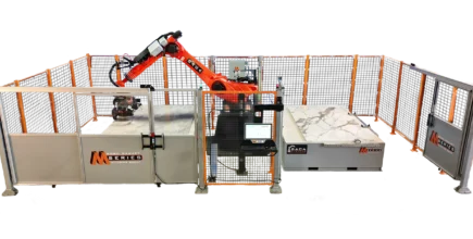 BACA Robo SawJet M Series 240 Dual Table cutting quartzite slab at headquarters with right door open